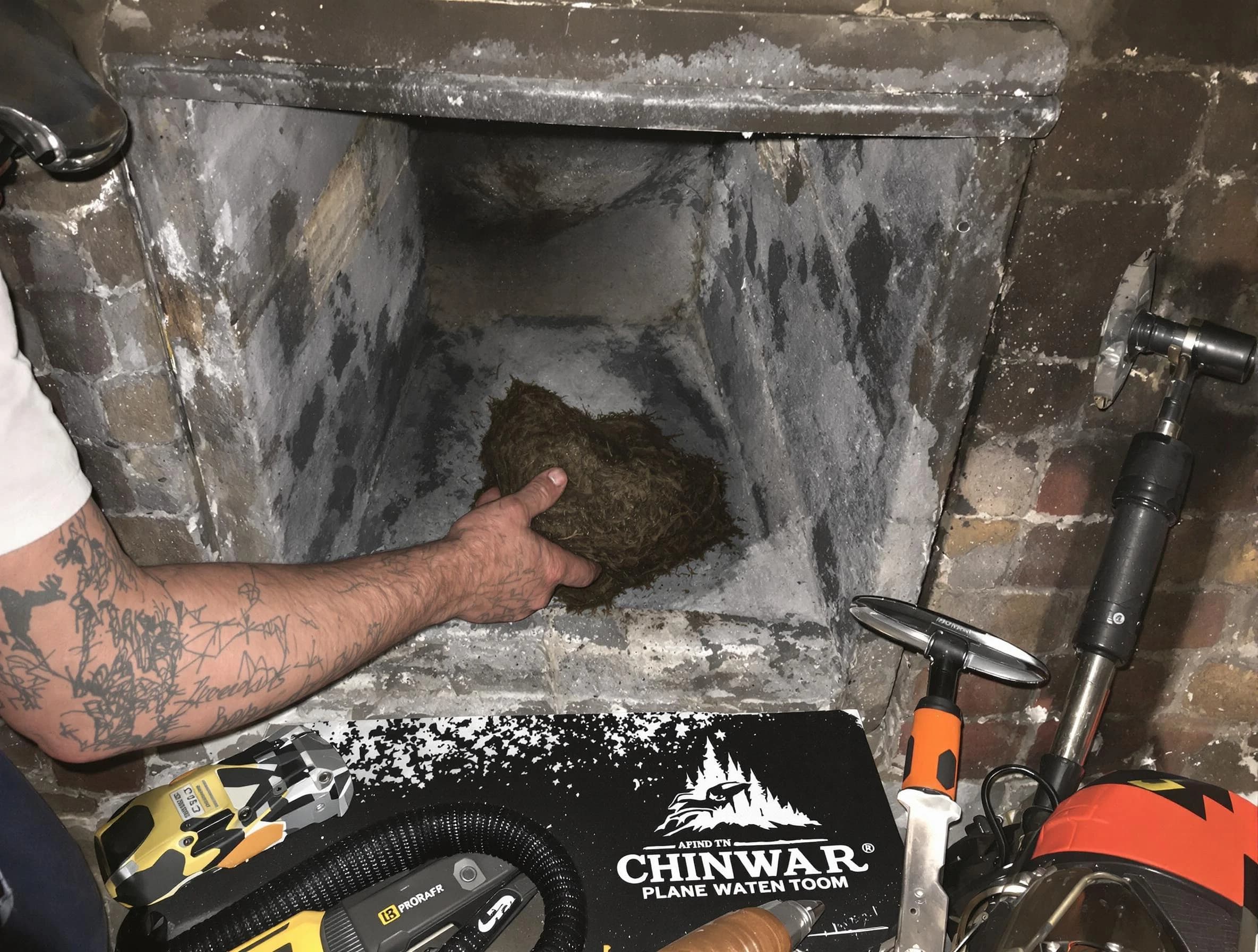 Conyers Chimney Sweep safely removing debris and screening chimney in Conyers, GA
