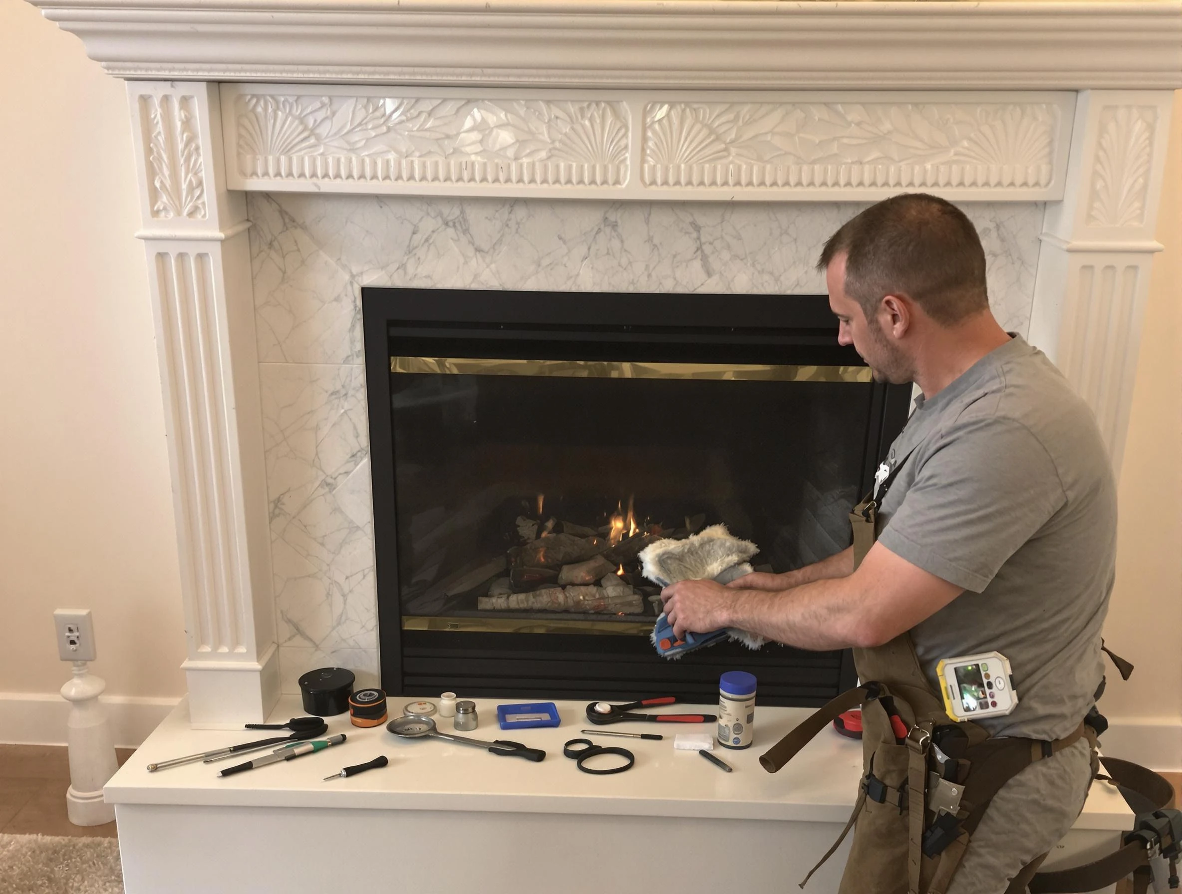 Conyers Chimney Sweep performing fireplace maintenance in Conyers, GA